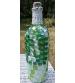 Mosaic bottle with abalone spider and fairy lights